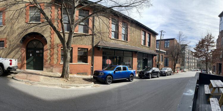 panoramic image of buildings on the block