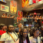group of children from Shiloh community center on spring break trip to world of coca cola