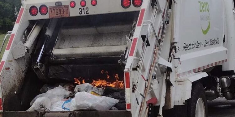 trash truck with flames