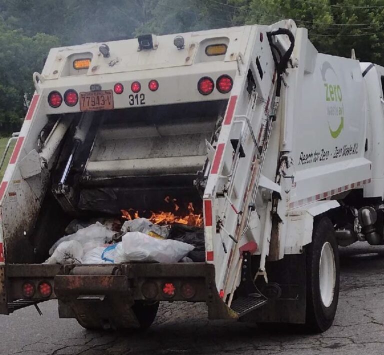 trash truck with flames