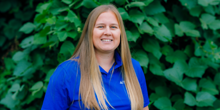 Christine Elyseev wearing blue shirt