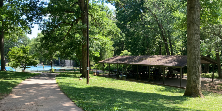 view of picnic shelter and pickleball courts