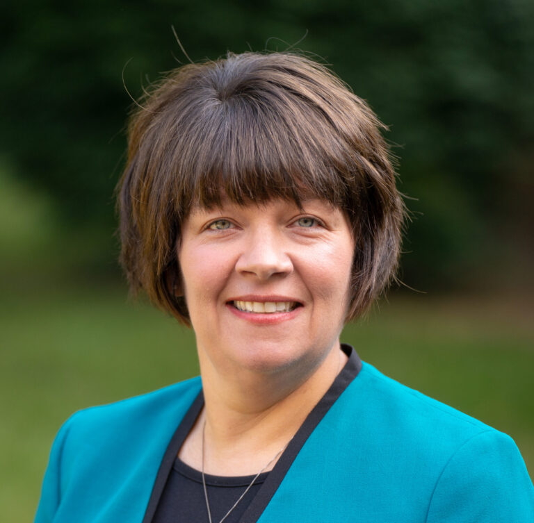 emily provance wearing a blue blazer