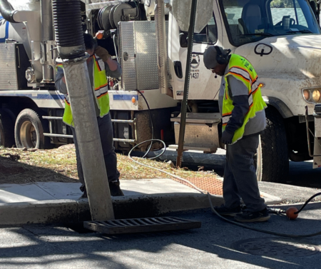 stormwater crews clearing the storm drain