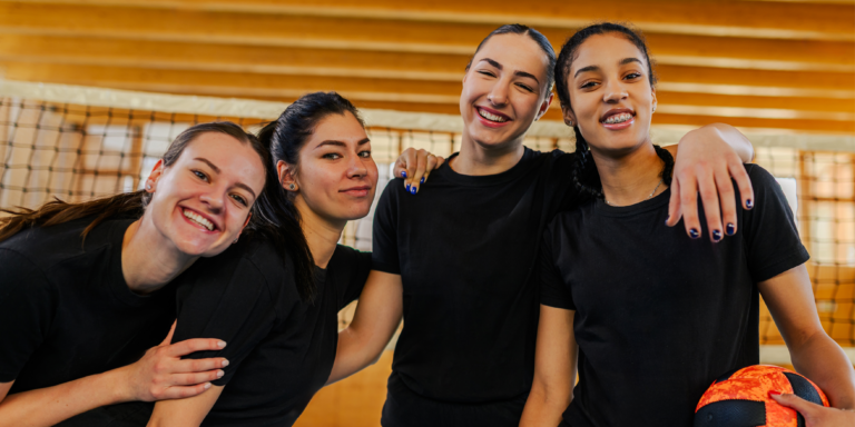 young girls in dance group wearing black t shirts