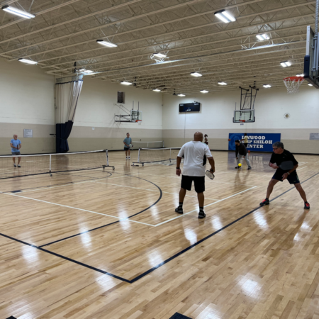 playing pickleball in gym