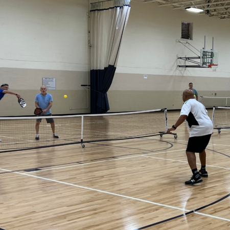 playing pickleball in gym