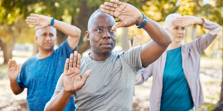 three senior citizens in exercise class