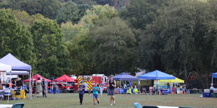 picture of people and tents at the 2023 festival of neighborhoods