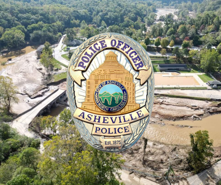 park with debris and asheville police logo